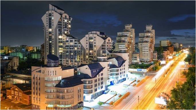 город